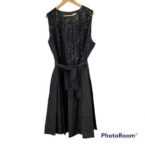 Calvin Klein black dress. Pleated satin skirt sequin upper belted. Size 22
